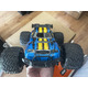 Швидкісна машинка на радіокеруванні 1:16 4WD 40 км/год: Позашляховий монстр-трак 4х4, 2 акумулятори, 2.4 ГГц, Б/У